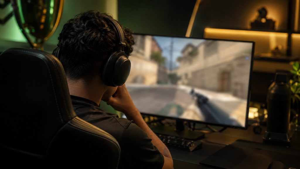 Illustrative anonymous player reviewing a replay, not a real player or match scene